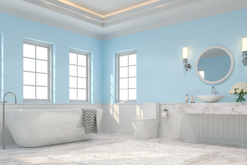 Soligt blått och vitt badrum