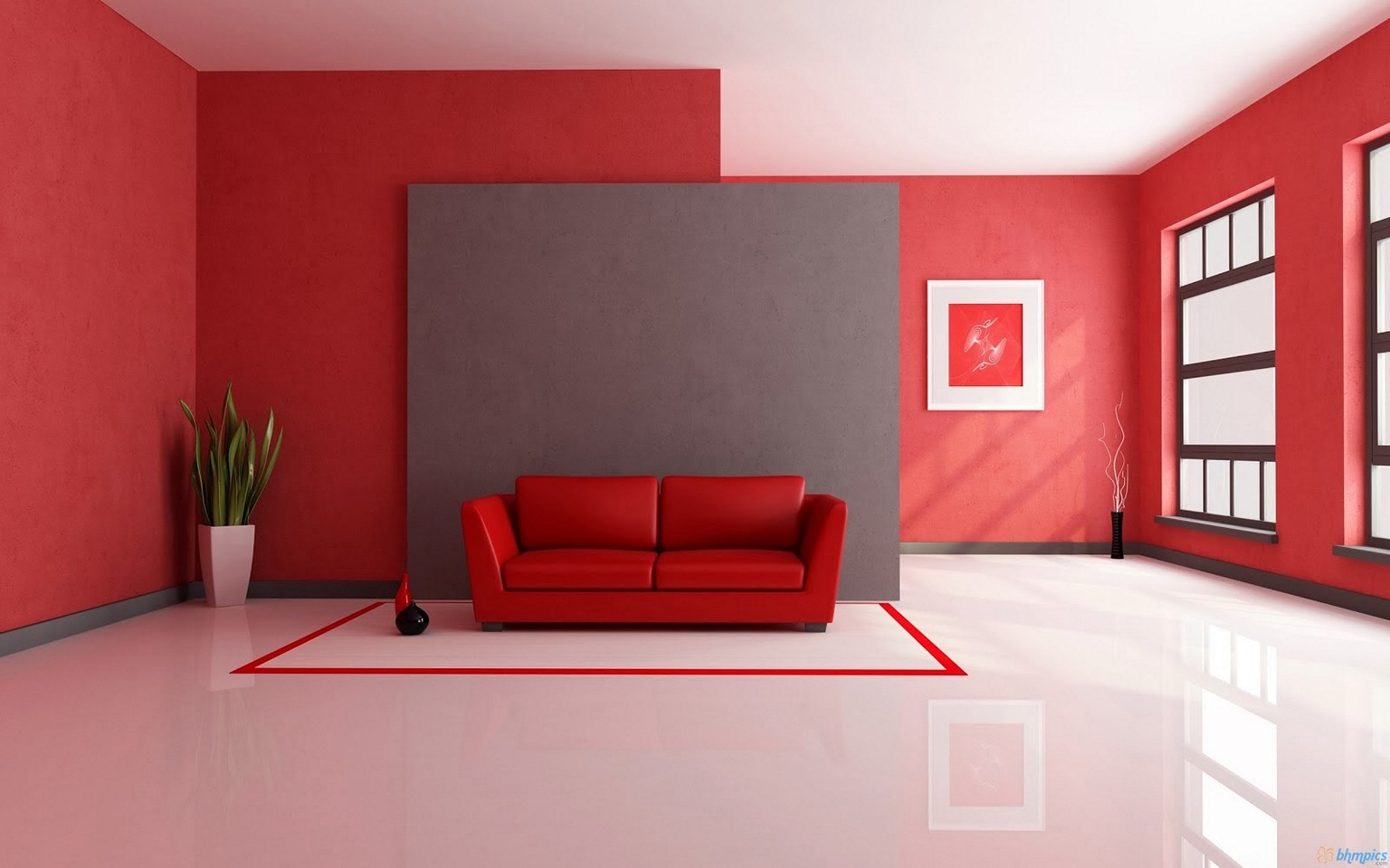 Djärvt rött, ljust minimalistiskt vardagsrum.